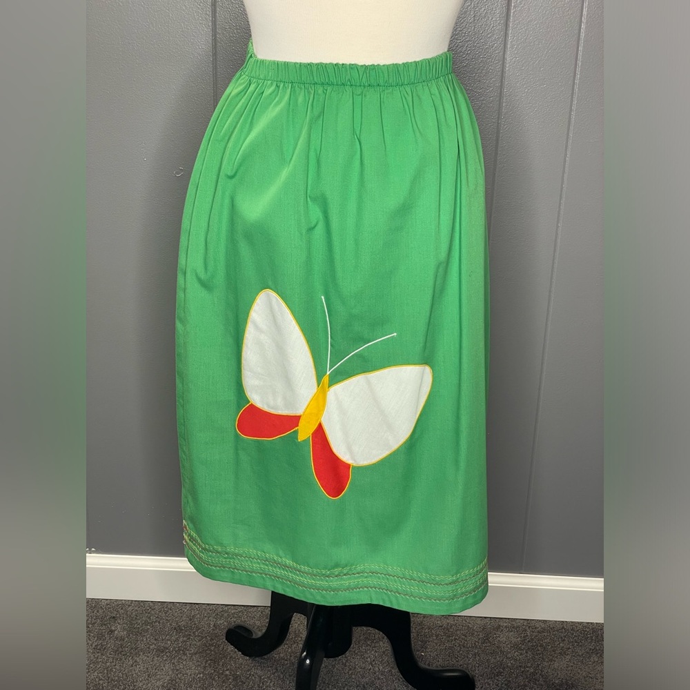 Vintage unique butterfly midi skirt! Size 12 but can fit much smaller.